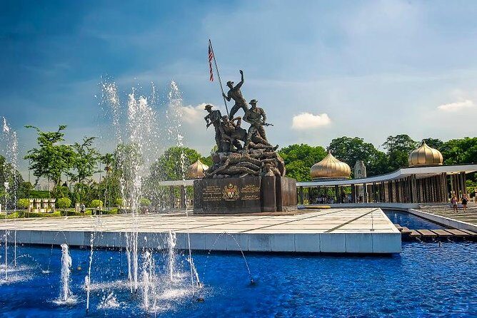 Best of Kuala Lumpur City Tour Including National Museum and National Monument - National Mosque of Malaysia: 1963 symbolism and teal-blue tile drama