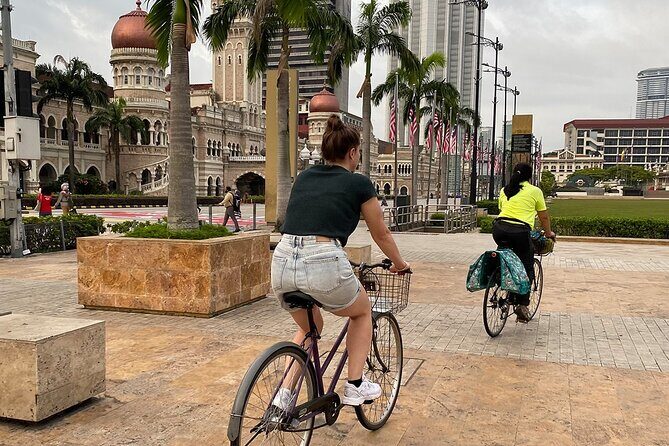 Cycling Through the Heart of Kuala Lumpur with Hotel Pickup - Picking the right clothes and shoes for KL temples and sun