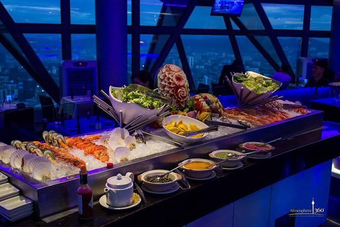 Dine-in at Orbit Revolving restaurant Kuala Lumpur(with transfer) - Pickup and Timing in KL: Where Your Evening Starts