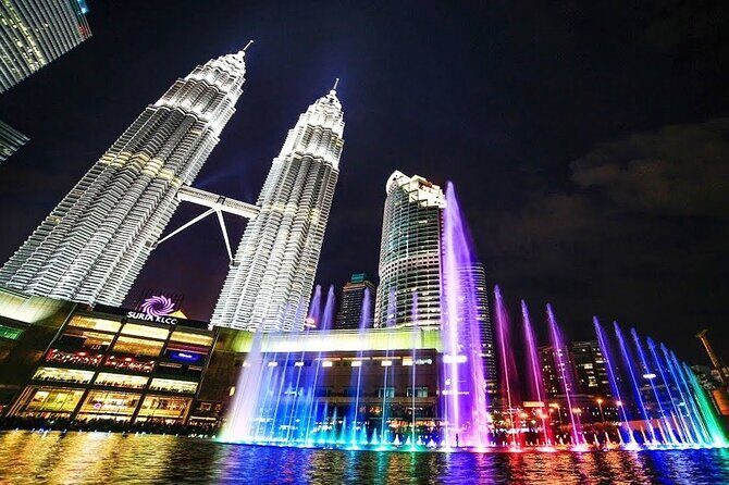 Discover The Best of Kuala Lumpur by Night - Chinatown after dark: Petaling Street, night market energy, and teh tarik