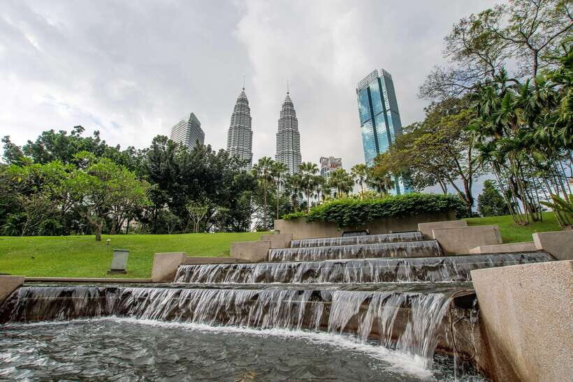 From Kuala Lumpur: City Tour with 21 Attractions - Batu Caves and Lord Murugan: the payoff, plus the stair reality