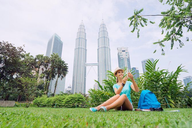Group Tour: Half-Day Kuala Lumpur City Exploration Tour - Petronas Twin Towers: The Photo Stop That Starts the Day