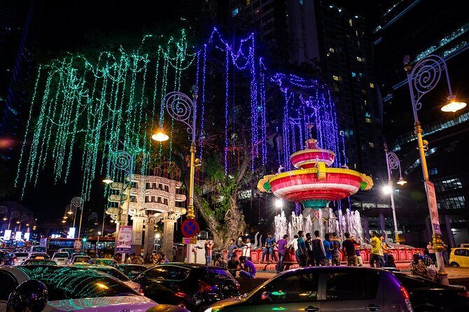 Immerse Yourself in Kuala Lumpur Heritage on a Night Tour - Chinatown at night: shopping lanes, street snacks, and temple photos