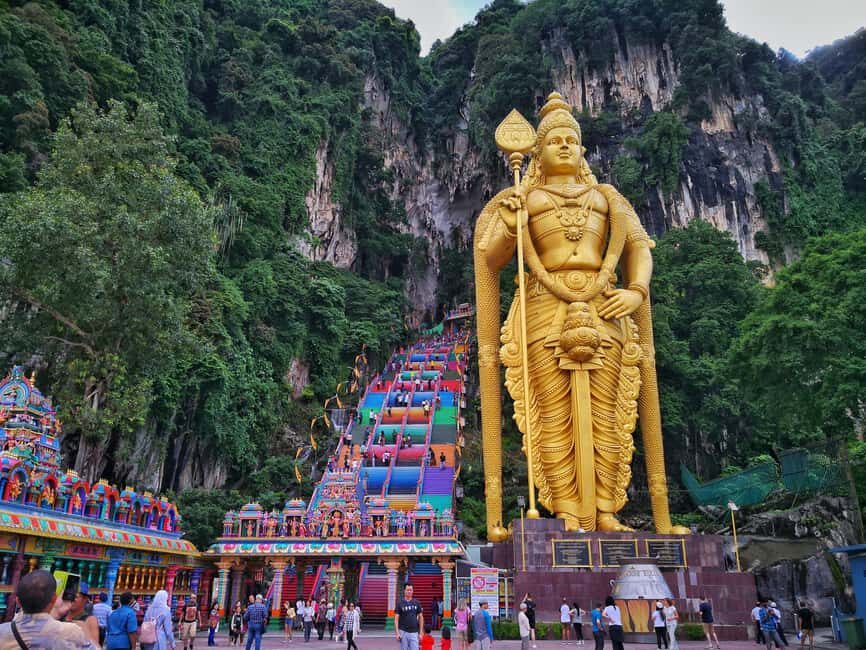 Kuala Lumpur: Batu Caves Half-Day Tour with Pick-Up Option - Getting to Batu Caves: The Climb, the Statue, and the Views
