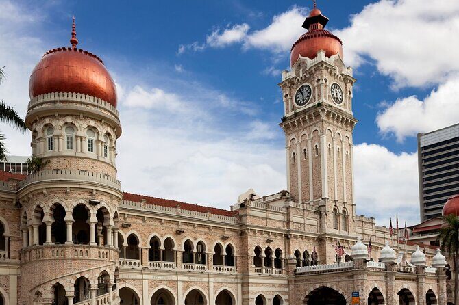 Kuala Lumpur City Tour with Batu Caves Discovery (Shared) - Batu Caves: the 272 steps and the Murugan statue that stops time