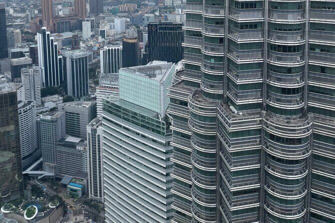 Kuala Lumpur Full Day City Tour with Petronas Twin Tower Tickets - Chinatown and Little India: Petaling Street and Brickfields in One Flow