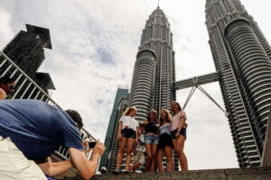 Private KL City Tour with Petronas Twin Towers & Batu Caves - Batu Caves: Lord Muruga, temple caves, and the stairs reality check