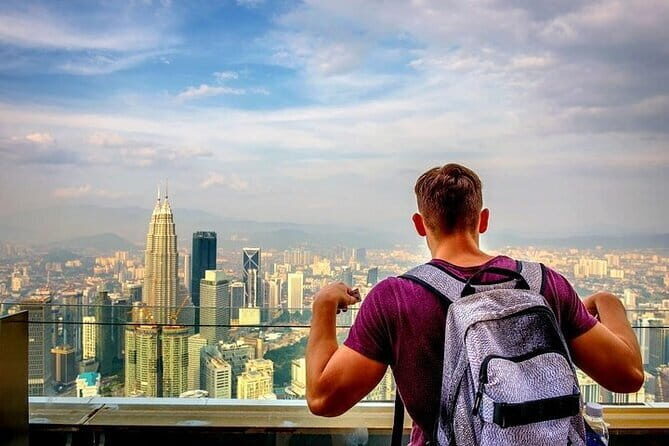 Private Kuala Lumpur City Tour with KL Tower & Batu Caves - Batu Caves: the climb to Lord Murugan and the cave temples