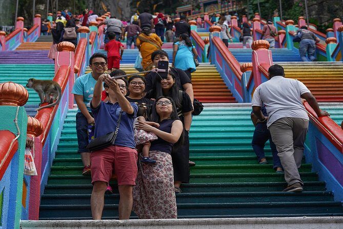 Private Tour Kuala Lumpur with Petronas Twin Towers Observation Deck & Batu Cave - Batu Caves: climbing the steps to the shrine